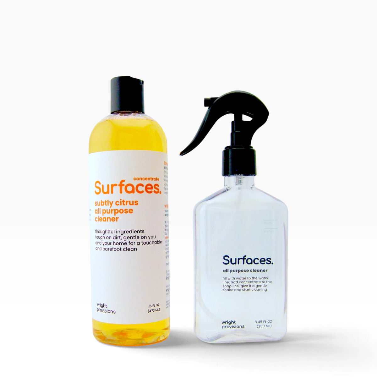 16oz bottle of surfaces all purpose subtly citrus concentrate with empty spray bottle to fill